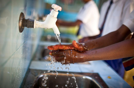 Student washing hands