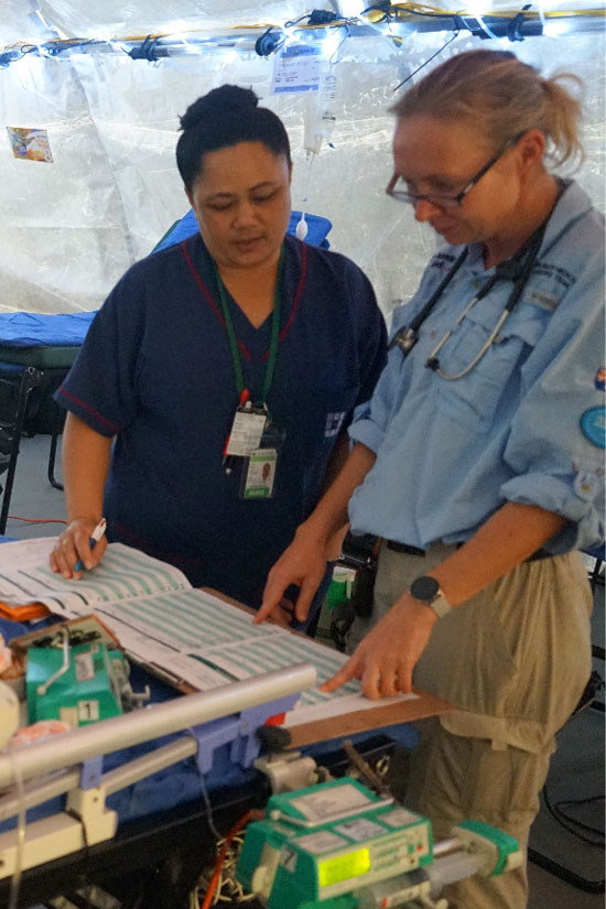 Photo of Samoa’s Ministry of Health Head Nurse Matilda Nofoaiga with a colleague.