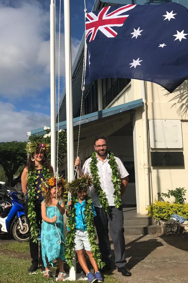 High Commissioner Dr Christopher Watkins raising Australian flag outside Australia’s new High Commission in Rarotonga with his family, wife and two young children. 