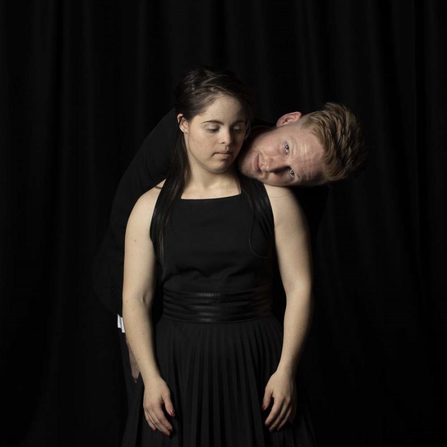A photo of two dancers. 