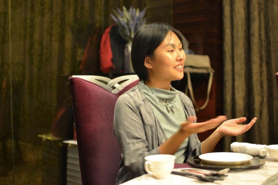 Cherry Zheng speaking at an event
