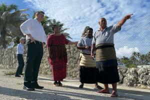 Image of officials with locals in Tonga.