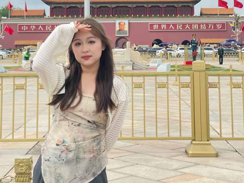 Image of Ariel with the Forbidden City in the background. 