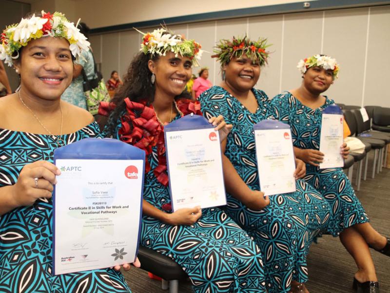 Photo of four Australian Pacific Training Coalition Tuvalu graduates. 