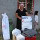 Tongan residents receive emergency relief supplies from the Australian Government through the Tongan National Emergency Management Office.