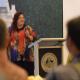Julie-Ann Lambourne speaking to an audience behind a lectern.
