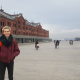 Photo of Luke Macaronas standing in front of Red Brick Warehouses