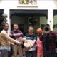 Group photo of Drummaking workshop participants with host Imad-Eddine Dably