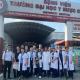 Group photo of the Central Queensland University sonography students in front of a clinic.