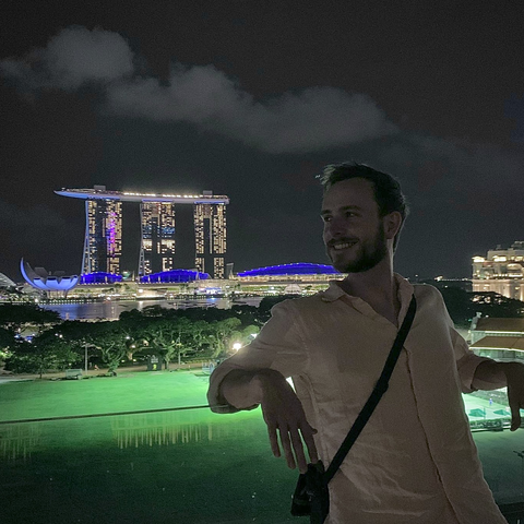 Tanner in front of the iconic Marina Bay Sands in Singapore.