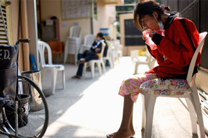 student in a Lao classroom