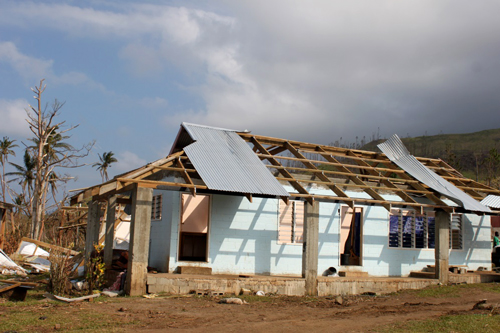 A badly damaged house in Fiji