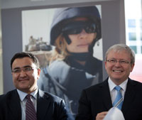 Photo of Australian Foreign Minister Kevin Rudd and Afghan Minister of Mines Wahidullah Shahrani attending the opening of the photographic exhibition.