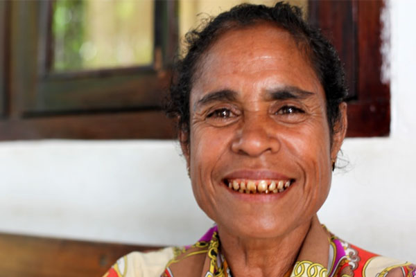 Collage of photos of women using mobile phones.