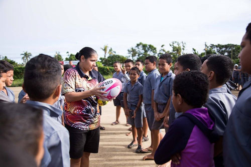 Belinda speaking to a group of children