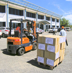 Woman talking to community health worker