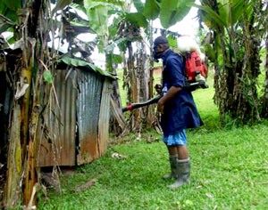 Fijian man fumigating toilets.