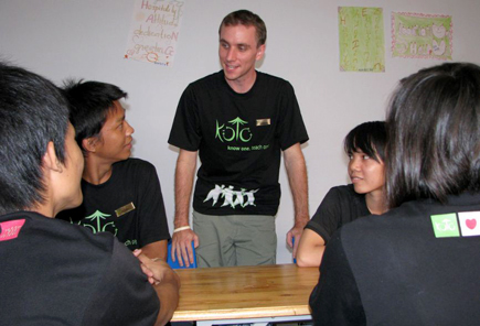 A teacher speaking to students