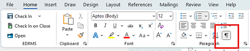 Screen image of Microsoft Word showing the location of the show/hide formatting button in the Home toolbar